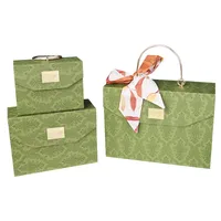 Vente en gros d'emballages cadeaux romantiques, boîte cadeau pliable de luxe pour ensemble de bougies avec poignée