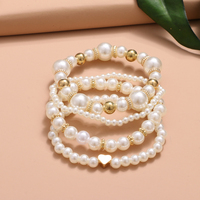 Mode amour coeur perle Bracelet 4 pièces ensemble Stretch bracelets porte-bonheur pour les femmes été bord de mer bijoux