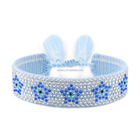 2025 haute qualité exquis estampillé à chaud étincelant strass artisanat tissé personnalisable diable yeux broderie gland Bracelet