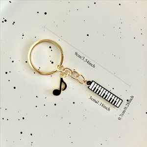 Llavero de instrumento musical con nota de piano esmaltada, colgante decorativo para mochila de estudiante, bonito llavero musical femenino - Product Image 5
