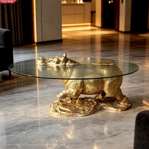 Mesa de Centro YOUFINE con Escultura de Hipopótamo de Bronce y Cubierta de Vidrio Templado Ovalado Transparente para Decoración de Vestíbulos de Hotel y Salas de Estar - Product Image 1