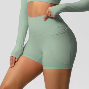 Shorts de yoga taille haute avec poches, sans coutures, couleur unie, en spandex et polyester, séchage rapide, logo sur la taille - Product Image 4