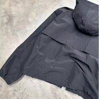Veste coupe-vent en nylon ripstop à carreaux avec capuche à revers élastique personnalisée par le fabricant pour hommes