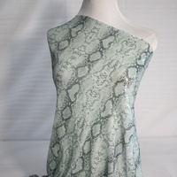 Tissu en maille à sequins imprimé peau de serpent scintillant de luxe, nouveau tissu à sequins développé pour les robes de scène et de soirée