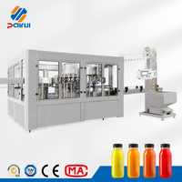 Machine de remplissage automatique de jus pour jus d'orange, de mangue, de pomme, de raisin, ligne de remplissage complète pour usine de bouteilles PET