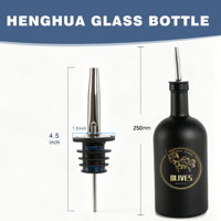 Bouteilles d'huile d'olive en verre blanc mat de luxe de forme ronde de 500 ml (16 oz) avec bec verseur, logo personnalisé en usine