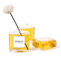 Vente en gros de flacons d'huile aromatique en verre transparent personnalisés avec bouchons compte-gouttes et boîtes cadeaux assorties pour les huiles essentielles