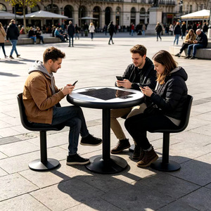 Table ronde en aluminium imperméable pour extérieur avec ports USB à charge solaire pour l'aménagement de parcs et de places publiques, design contemporain pour 4 personnes - Product Image 1