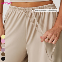 Ensemble Sport Femme 2 Pièces Janya: Pantalon de Jogging Décontracté à Cordon et Débardeur de Yoga Séchage Rapide – Tenue de Sport Fitness Très Vendue