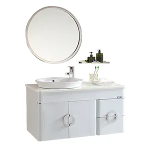 Pequeño cuarto de baño moderno colgado en la pared tocadores de baño con forma redonda espejo y cajón