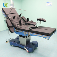 Table d'opération électrique à cinq fonctions, table chirurgicale transparente aux rayons X, capacité de charge de 180 kg, batterie intégrée, hôpital
