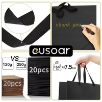 Sac en papier kraft laminé noir mat de luxe avec logo personnalisé pour l'artisanat et l'emballage de shopping de bougies avec poignée de Guangzhou
