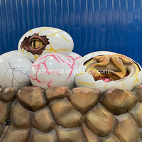 Œil de dinosaure animatronique télécommandé pour aire de jeux, modèle d'œil interactif fabriqué dans un nid d'œuf de dinosaure