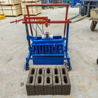 Machine à fabriquer des briques en ciment d'Afrique, type élargi, prix bas et populaire, produit des blocs à partir de pierre