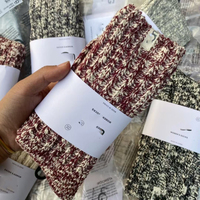 Calcetines de lana gruesa de punto termo para mujer, marca U, cálidos y cómodos para invierno, con logo en el bajo y tejido acanalado, para uso diario, al por mayor.