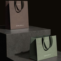 Sac d'emballage en papier de luxe personnalisé propre logo imprimé au détail de vêtements sac d'emballage à provisions en papier pour vêtements