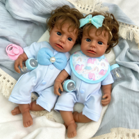 Poupée Reborn exquise de petite taille avec des cheveux courts Conception réaliste en silicone Détaillant délicat Article de collectionneurs de peau douce