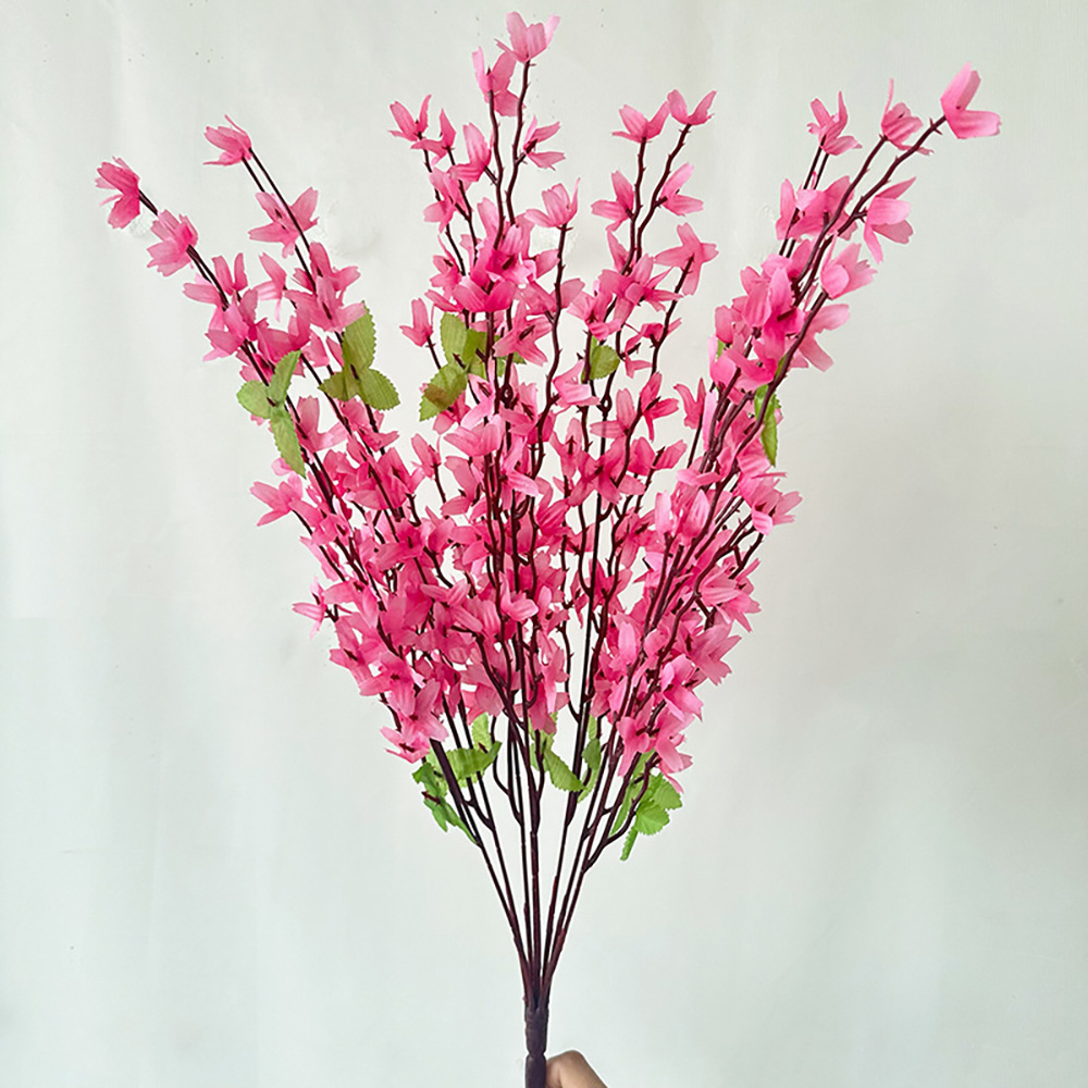 Lot de sept branches pour accueillir le printemps, rose