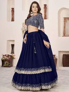 Lehenga bleu foncé moderne et fluide en georgette douce, orné d'une bordure en dentelle à sequins argentés, ajoute une touche d'élégance royale et de brillance. Prix de gros. - Product Image 4