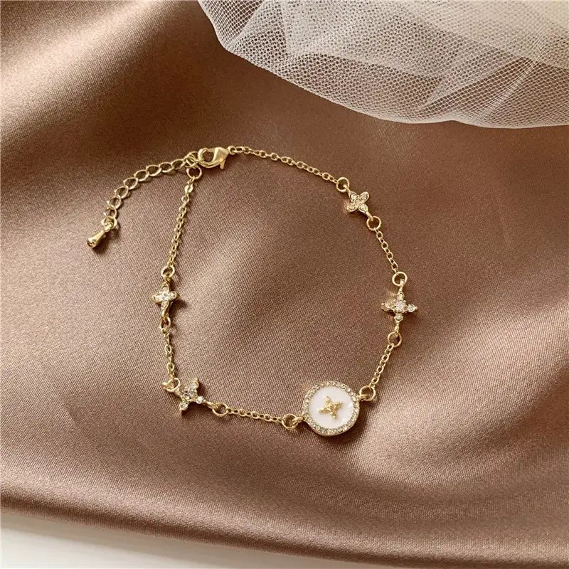 Nuovo Micro-intarsiato zircone prugna fiore croce di luce braccialetto di stile di lusso high-end di nicchia di disegno dei monili di regalo per delle donne