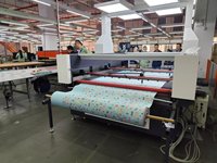 150瓦自动送料CO2激光切割机软件控制数控纺织品切割合适1812 1814新面料服装零售水晶