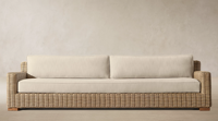 Canapé d'extérieur en osier élégant, résistant aux intempéries, avec cadre tressé à la main et coussins beiges, mobilier de salon modulaire pour jardin