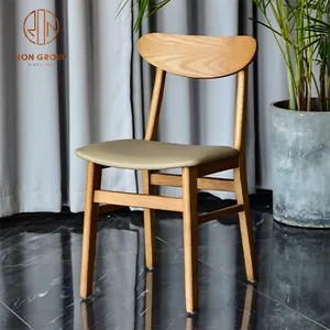 Modern yüksek kaliteli yemek sandalyesi mobilya üreticisi deri katı ahşap PU sünger otel restoran sandalyeleri