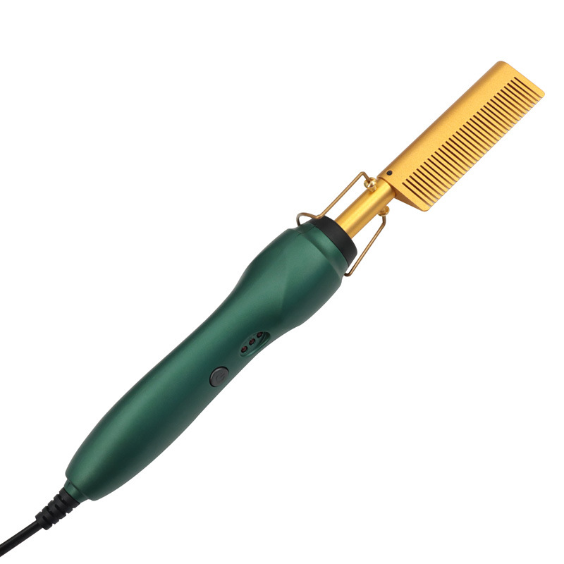 Green handle with gold comb