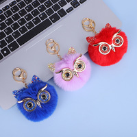 Nouveau porte-clés pendentif boule de fausse fourrure de loutre avec sequins dorés en forme de hibou pour sac d'écolier, vente en gros