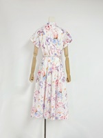 Robe élégante à col montant manches courtes taille haute bouton épissé robe mi-longue femme nouveau