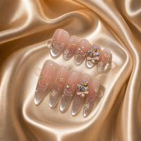 Faux ongles de luxe faits main, grands, avec breloques en zircone irisée, nœuds 3D, paillettes argentées et motif ondulé ovale, à coller sur les doigts