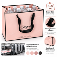 Sacs en papier de luxe personnalisés roses avec logo, poignées en ruban noir, sacs de shopping de luxe pour les boutiques de vêtements, les cosmétiques et les marques de cadeaux
