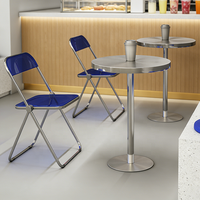 Modernes Casual-Restaurant-Möbelset, einschließlich Esstische, Klappstühle und Doppelhocker