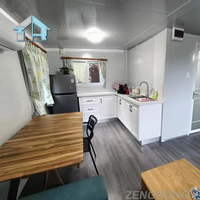 Maison mobile préfabriquée en conteneur à panneaux sandwich en acier de 20 pieds, extensible, confortable, à deux ailes, en kit, portable, petite maison