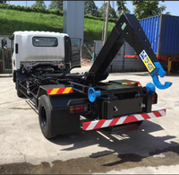 Camion benne à bras articulé 18 tonnes Howo pour déchets, fonctionnement fiable