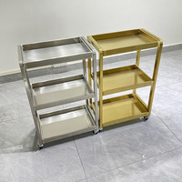 Chariot de Salon Haut de Gamme en Métal Doré à 3 Niveaux avec Plateau Anti-déversement, Chariot Roulant pour Outils de Beauté pour Salon de Coiffure, Spa, Onglerie et Studio de Cils