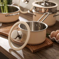 Ensemble de casseroles et poêles en acier inoxydable beige antiadhésif avec couvercle en verre, compatible induction