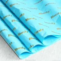 Papier d'emballage estampillé en feuille haute brillance jaune bleu papier d'emballage imprimé à la mode haut de gamme pour les marques papier de soie imprimé