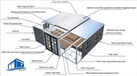 Maison-conteneur extensible de 40 pieds Bâtiments à structure en acier Chambre à coucher avec cadre noir, mur ancien, motif en bois de chêne gris,