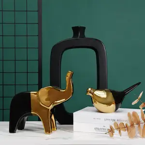 घर की सजावट के टुकड़े के लिए बिजली से गोल्डन चीनी मिट्टी के बरतन पक्षी मूर्ति लक्जरी - Product Image 1