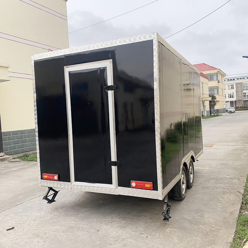 Commercial-grade Food Truck Equipment Including Exhaust Hoods, Griddles, and Storage Racks