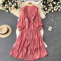Nouvelle mode de robes de printemps à manches longues de couleur unie et col en V robe longue ample décontractée en dentelle pour femme