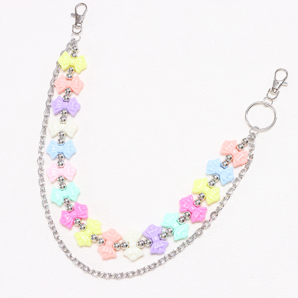 Double-layered trouser chain with bow