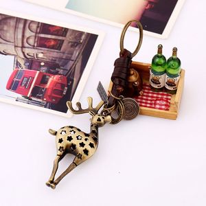LLavero de Metal de cuero tejido hecho a mano creativo Vintage colgante <span class=keywords><strong>Animal</strong></span> elefante jirafa oso llavero de coche accesorio de decoración - Product Image 5