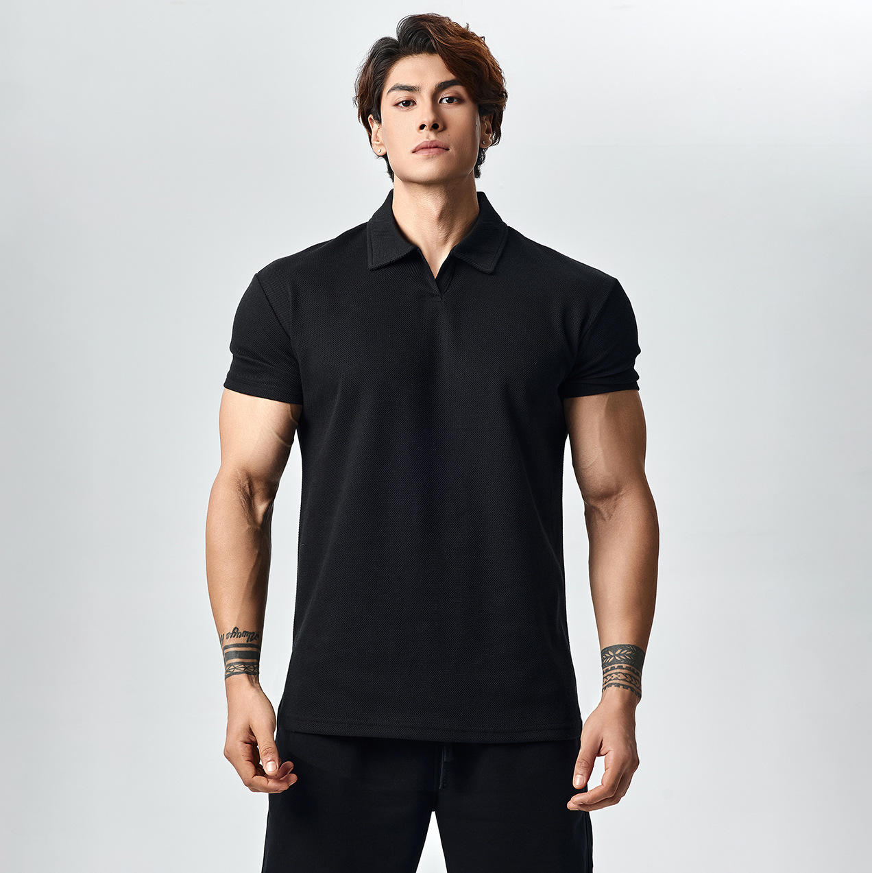 Black polo buttonless short sleeves