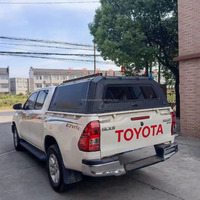 Hilux vente en gros 4X4 acier 300kgs capacité de charge noir arrière camionnette bouchons Toppers auvent pour le camping