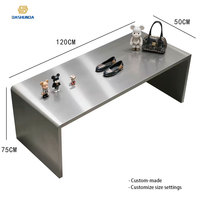 Table de présentation à plusieurs niveaux en acier inoxydable de luxe pour vêtements, chaussures, sacs, magasin de détail