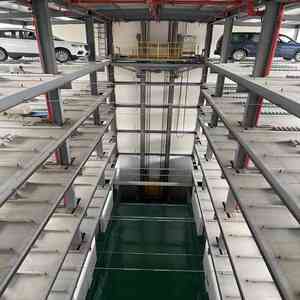 Aparcamiento Vertical automático de alta calidad en China Torre de estacionamiento con motor inteligente Sistema de elevación de automóviles automatizado en modo de conducción - Product Image 1