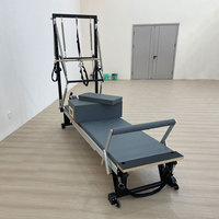 Reformer Pilates Demi-Tourneuse Personnalisable en Couleur, Construction en Alliage d'Aluminium pour Studios Domestiques et Commerciaux