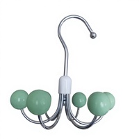 Porte-manteau rotatif à six griffes, design élégant pour rangement domestique, en métal durable